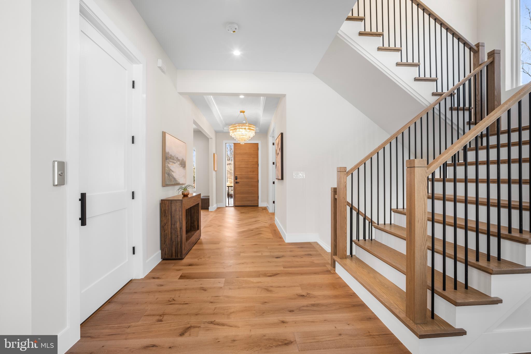 1935 Foxhall Road McLean, VA 22101 - Photo 22 of 80 a view of a hallway with wooden floor and entryway