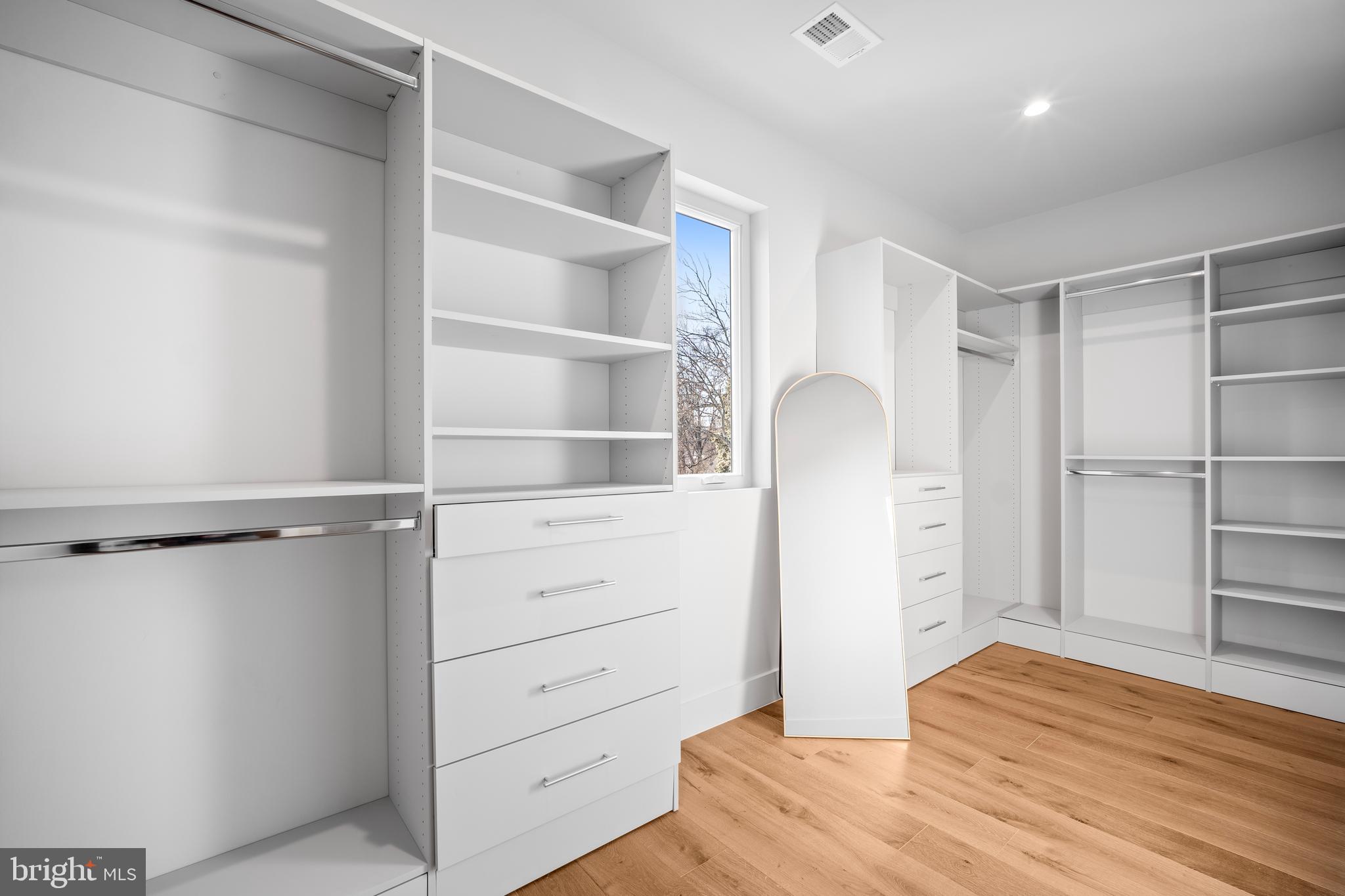 1935 Foxhall Road McLean, VA 22101 - Photo 45 of 80 a view of walk in closet with empty racks