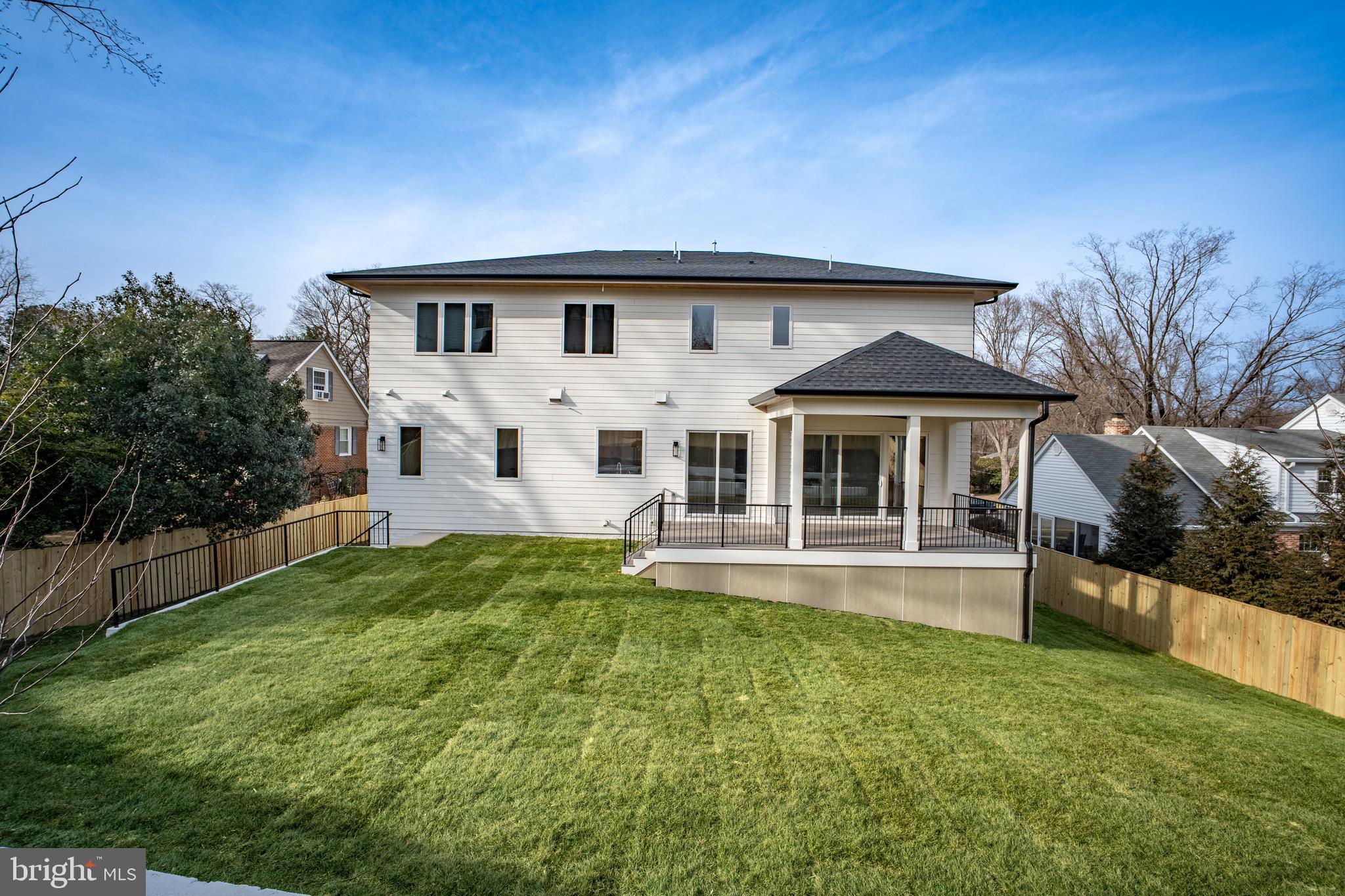 1935 Foxhall Road McLean, VA 22101 - Photo 79 of 80 a front view of a house with a yard