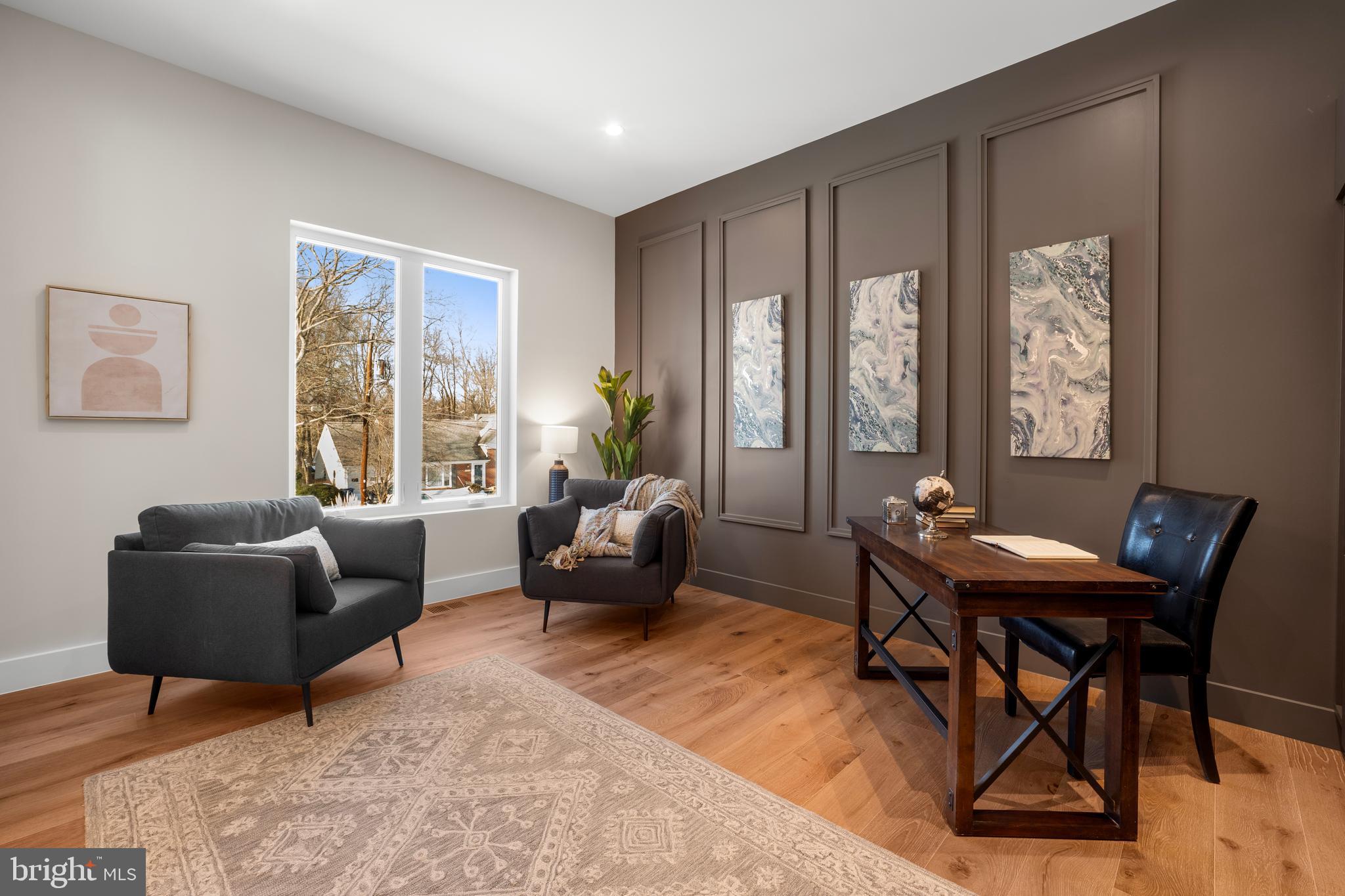 1935 Foxhall Road McLean, VA 22101 - Photo 10 of 80 a living room with furniture and a large window