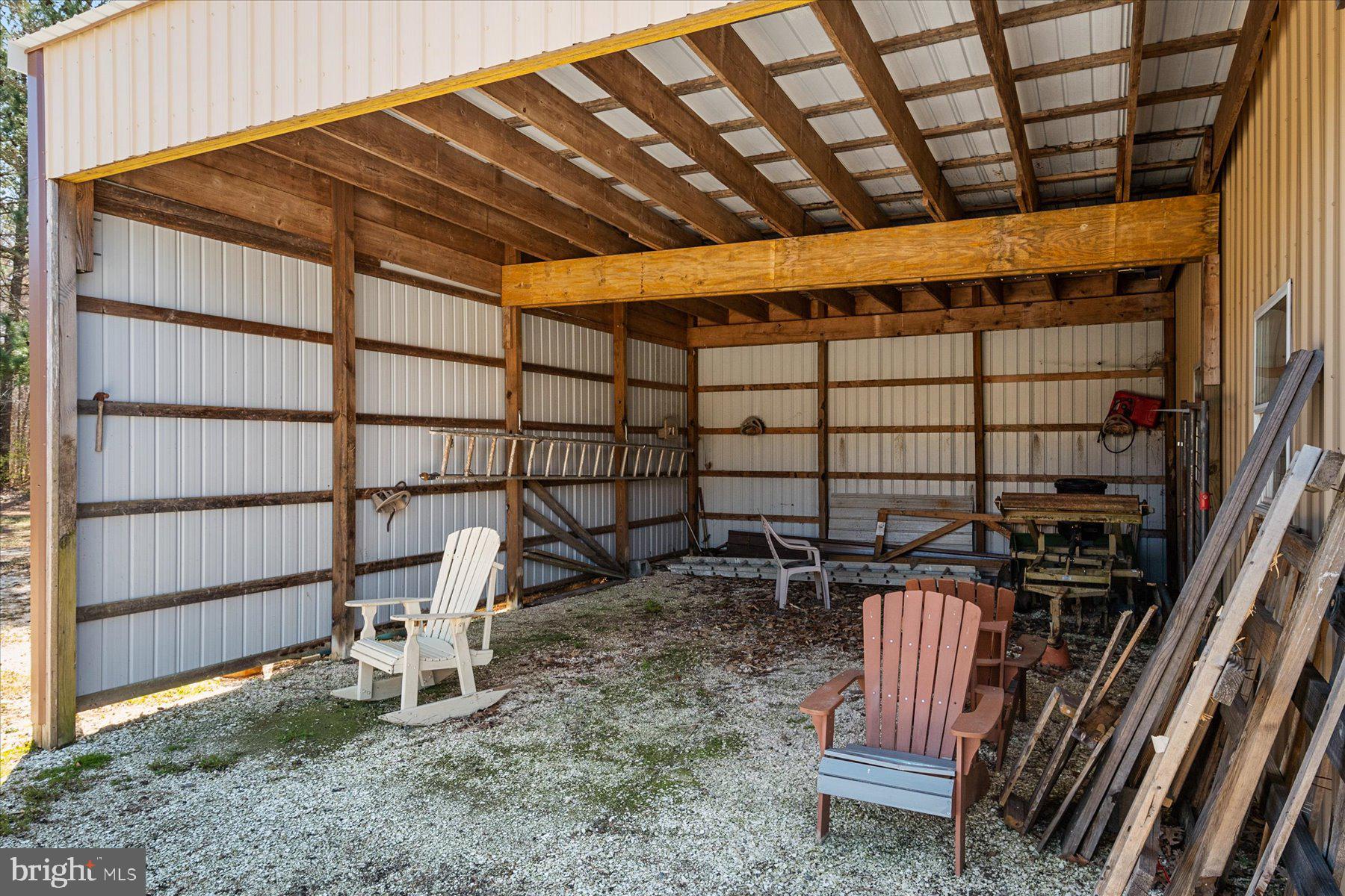 2107 Church Creek Road Cambridge, MD 21613 - Photo 56 of 84 Covered storage outside of Pole Barn