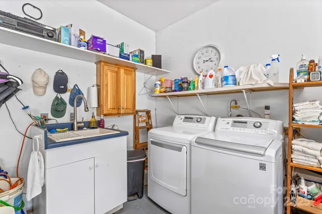 a view of storage room with washer and dryer