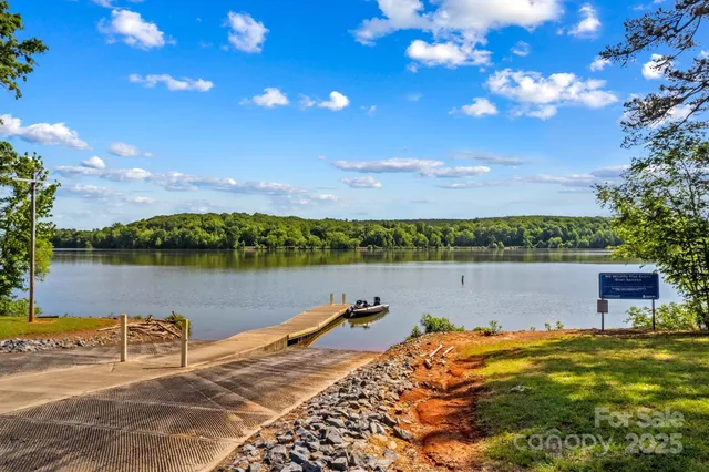 a view of a lake with a city