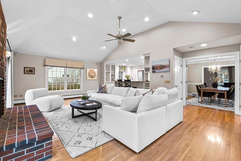 24 Garrison Road Wellesley, MA 02482 - Photo 11 of 32 a living room with furniture and a large window