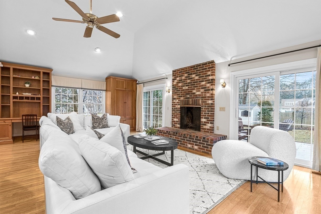 24 Garrison Road Wellesley, MA 02482 - Photo 12 of 32 a living room with furniture and a fireplace
