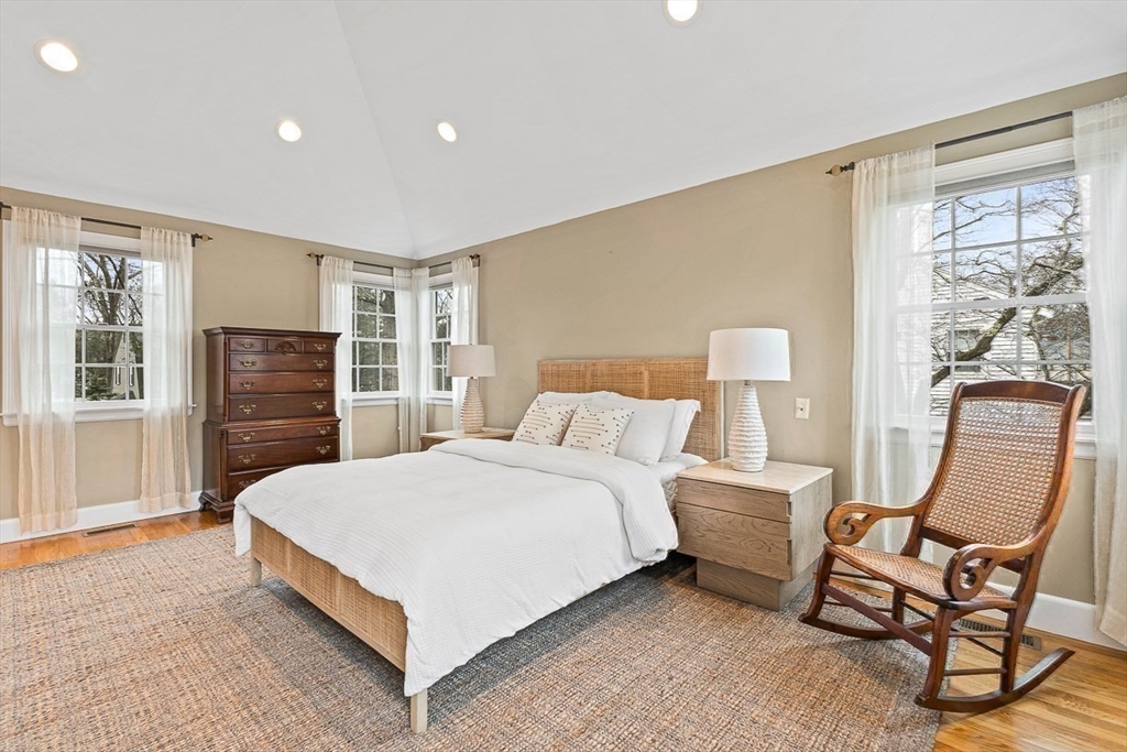 24 Garrison Road Wellesley, MA 02482 - Photo 21 of 32 a bed room with a bed and chair