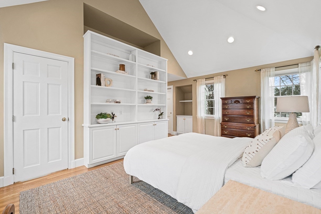 24 Garrison Road Wellesley, MA 02482 - Photo 22 of 32 a bedroom with a large bed and closet