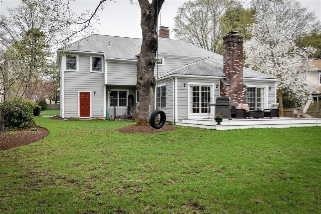 24 Garrison Road Wellesley, MA 02482 - Photo 32 of 32 a house view with a garden space