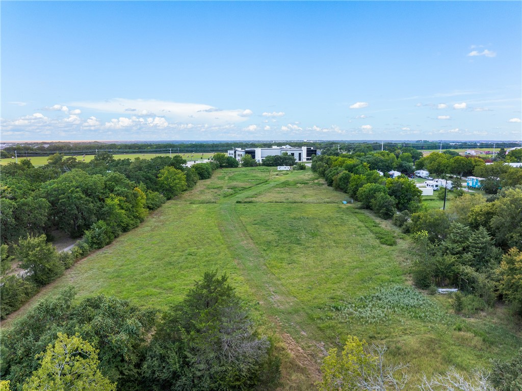 3949 F And B Road College Station, TX 77845 - Photo 5 of 7 a view of a large building with a garden