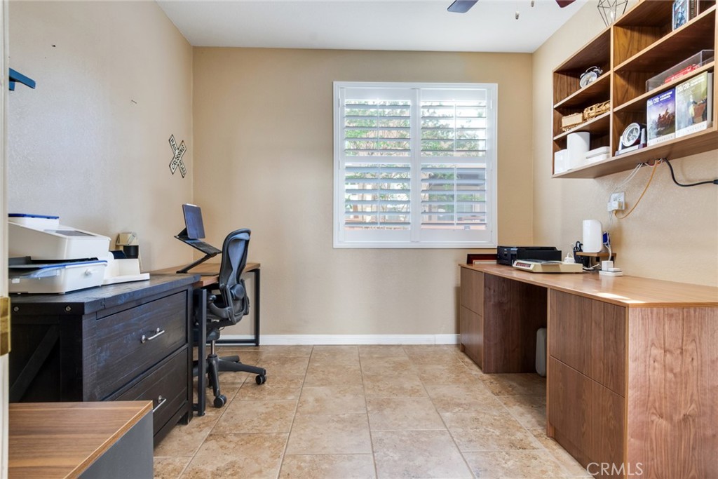 20885 Bakal Drive Riverside, CA 92508 - Photo 15 of 47 a workspace with furniture and a window