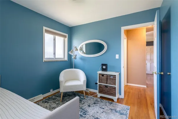 a workspace with furniture and a window