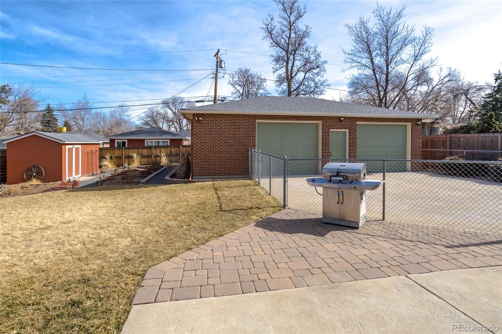 4530 South Inca Street Englewood, CO 80110 - Photo 31 of 37 a view of a backyard with table and chairs