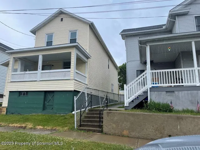 a house view with a outdoor space