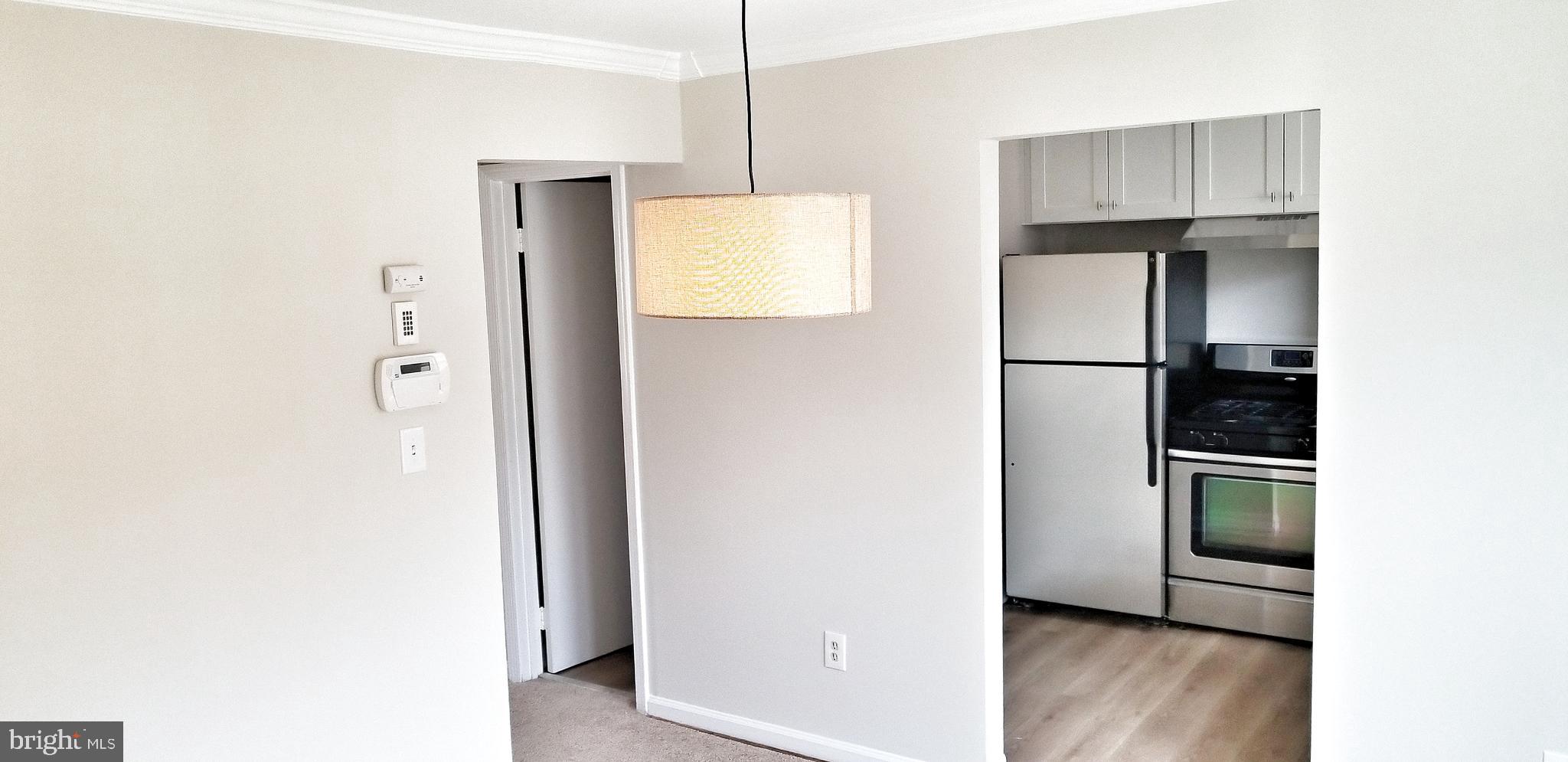 1763 Addison Road South District Heights, MD 20747 - Photo 7 of 23 Dinning room view into kitchen