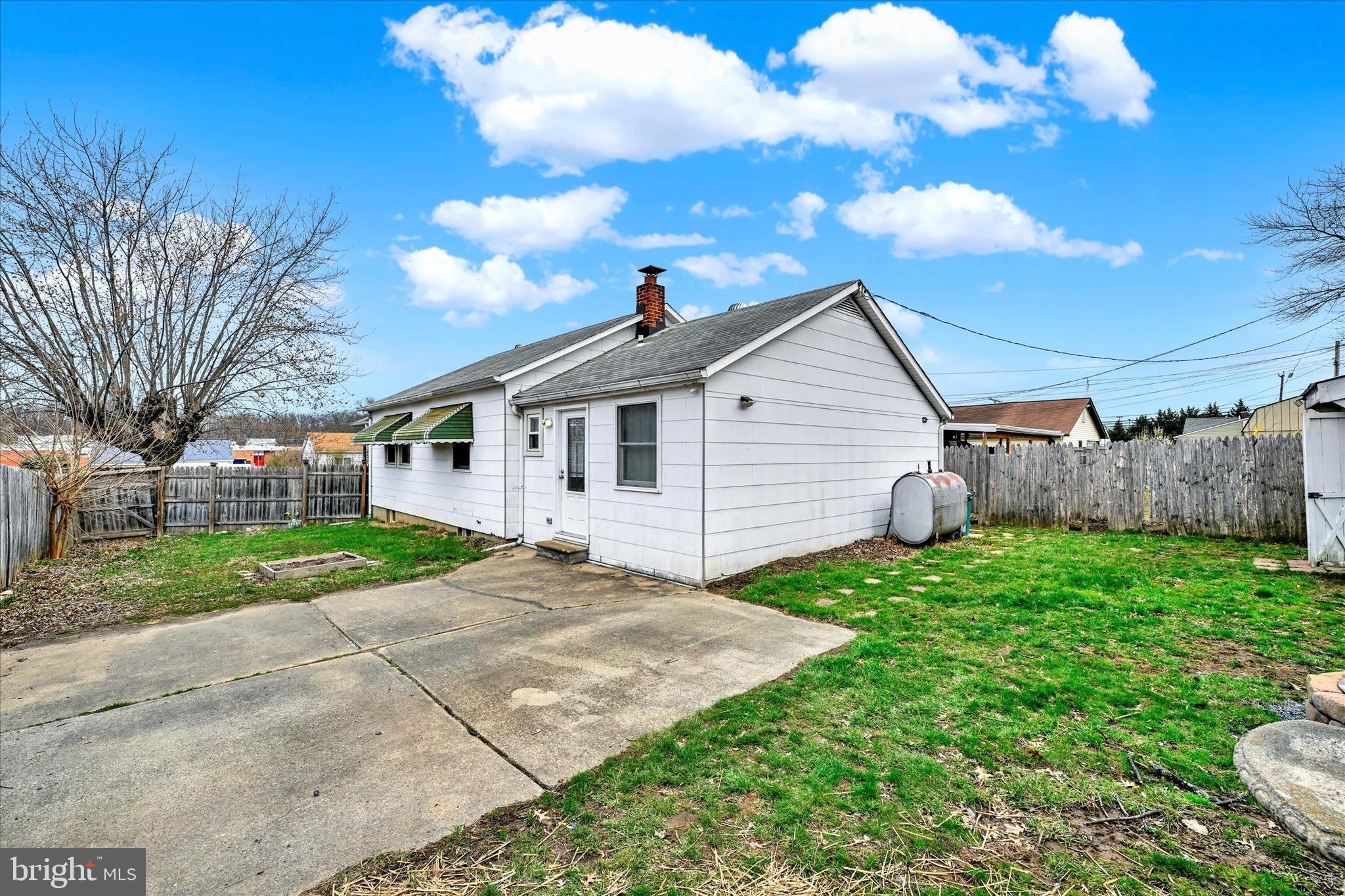 563 Compass Road East Baltimore, MD 21220 - Photo 18 of 23 a view of a house with a backyard