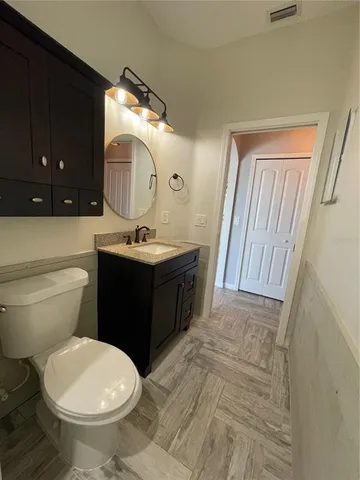 a view of yard with swimming pool and green space