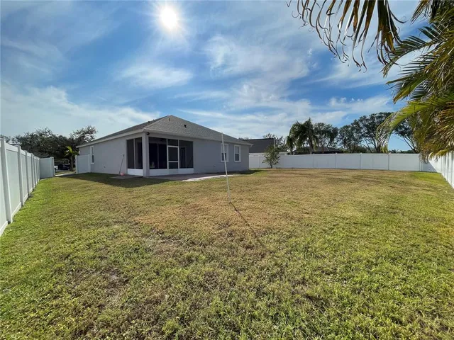 a view of a park with sitting area
