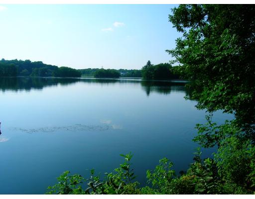 95 Russell Road Wellesley, MA 02482 - Photo 5 of 5 a view of a lake with houses in background