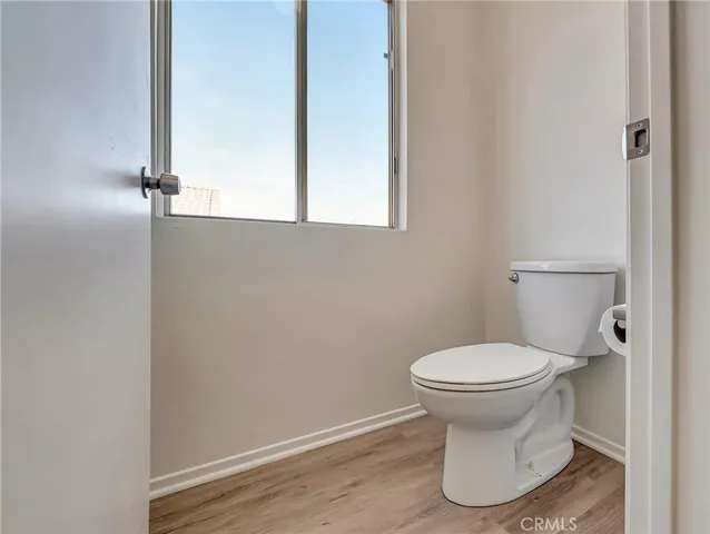 a spacious bathroom with a tub sink shower and mirror