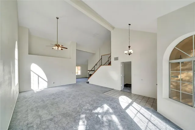 a view of a livingroom with a staircase