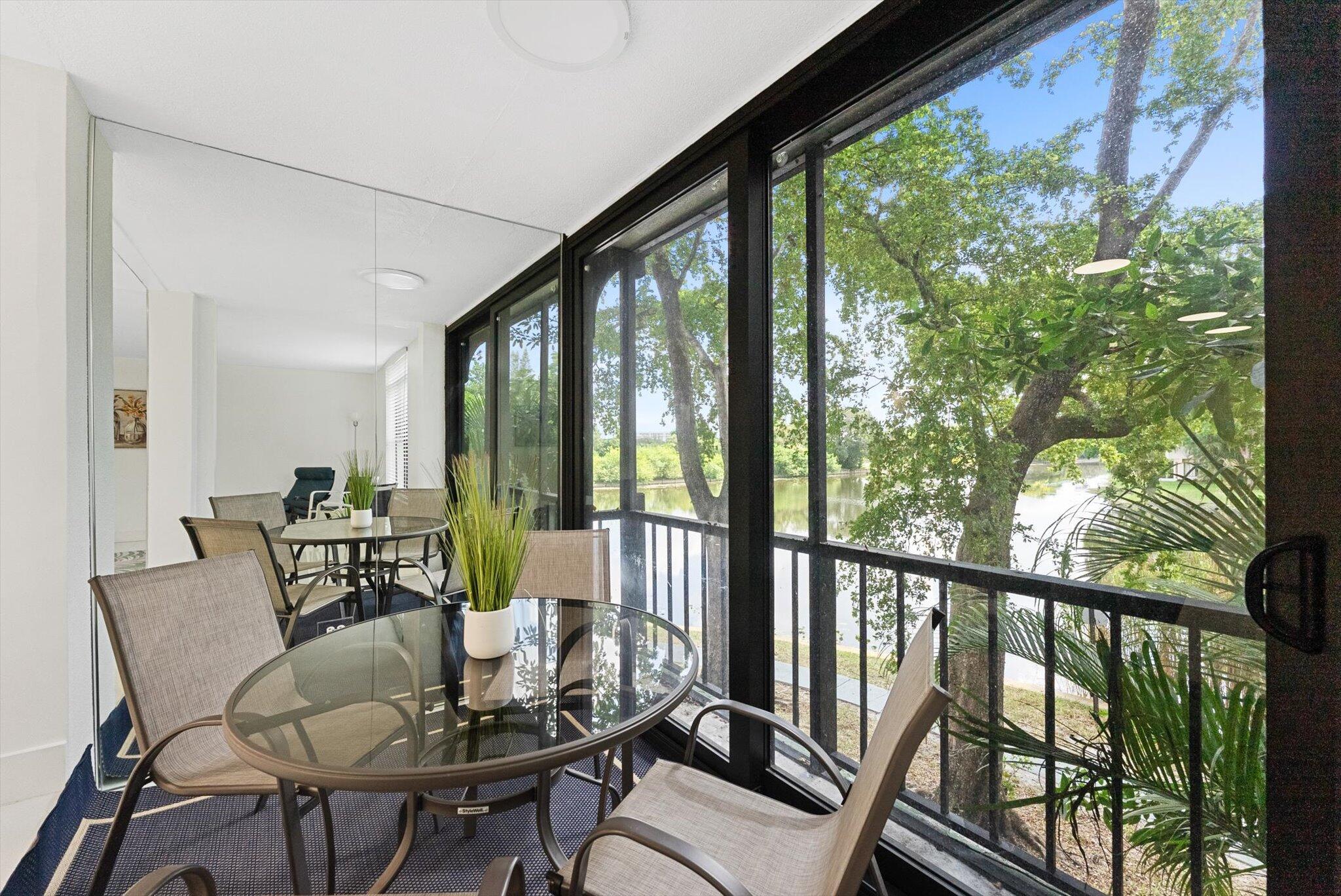 3730 Inverrary Drive, Unit 2L Lauderhill, FL 33319 - Photo 8 of 17 a view of a dining room with furniture window and outside view