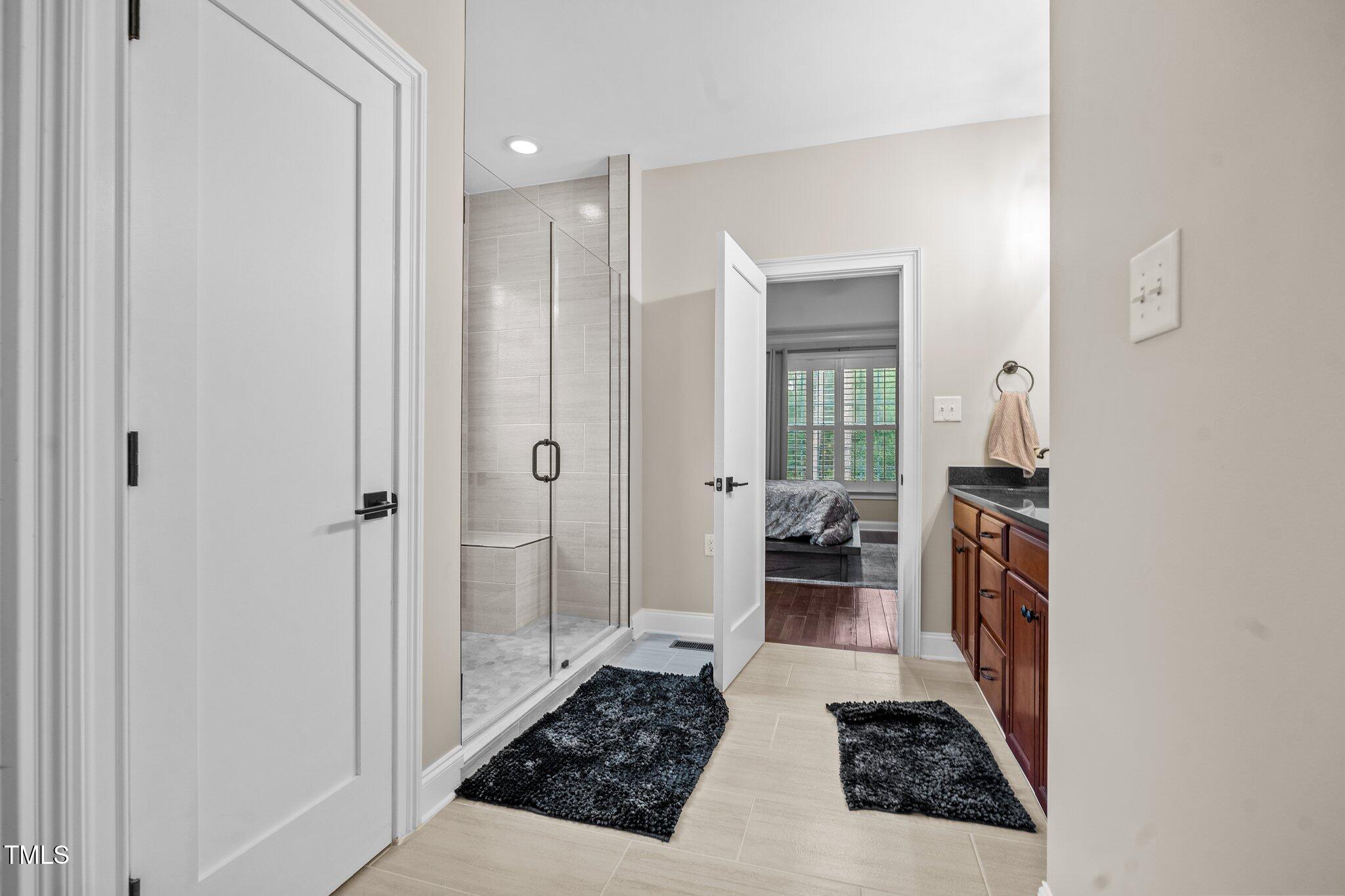 200 Heather Brook Circle Spring Lake, NC 28390 - Photo 12 of 36 a walk in closet and a mirror