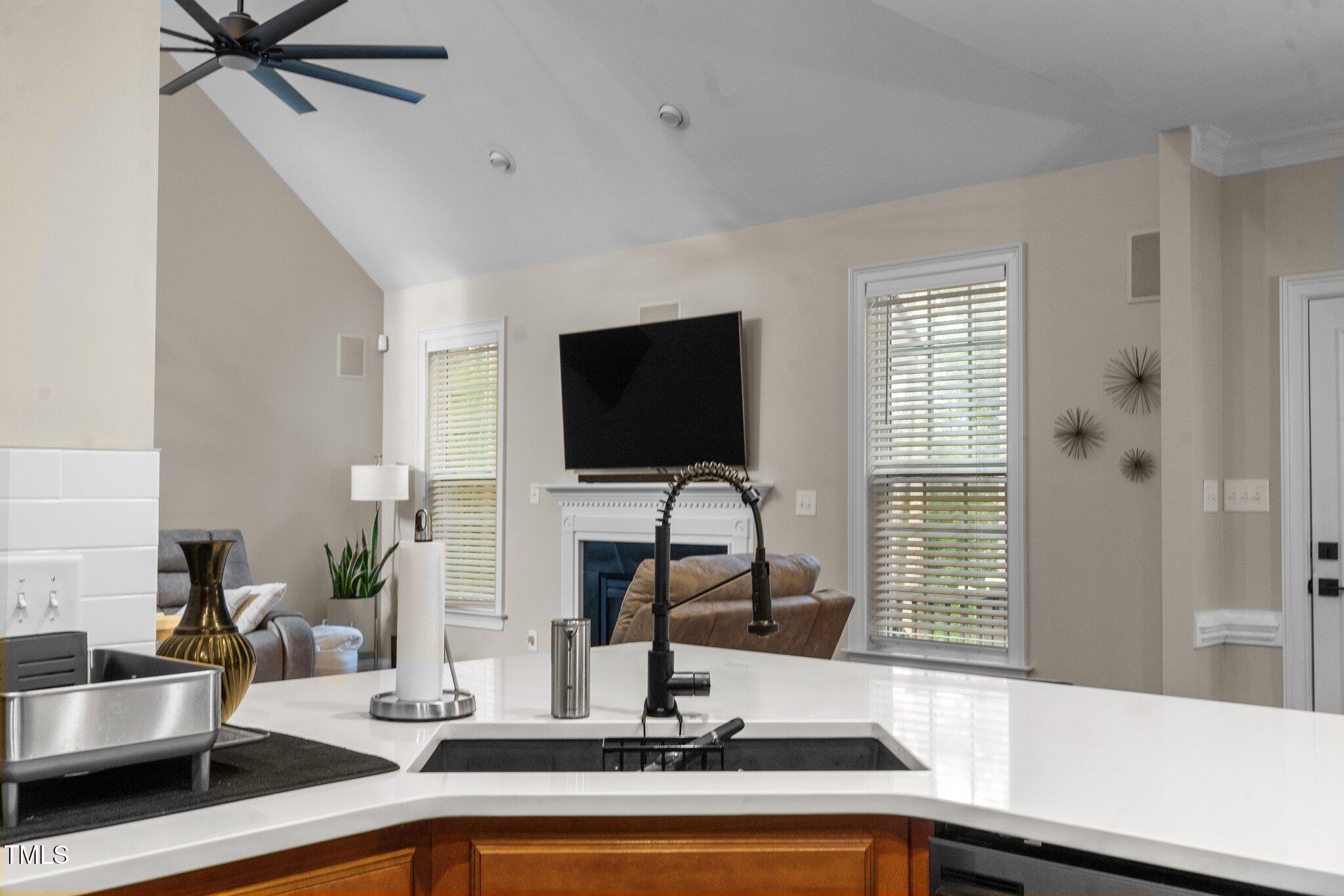 200 Heather Brook Circle Spring Lake, NC 28390 - Photo 16 of 36 a kitchen with a sink and a mirror