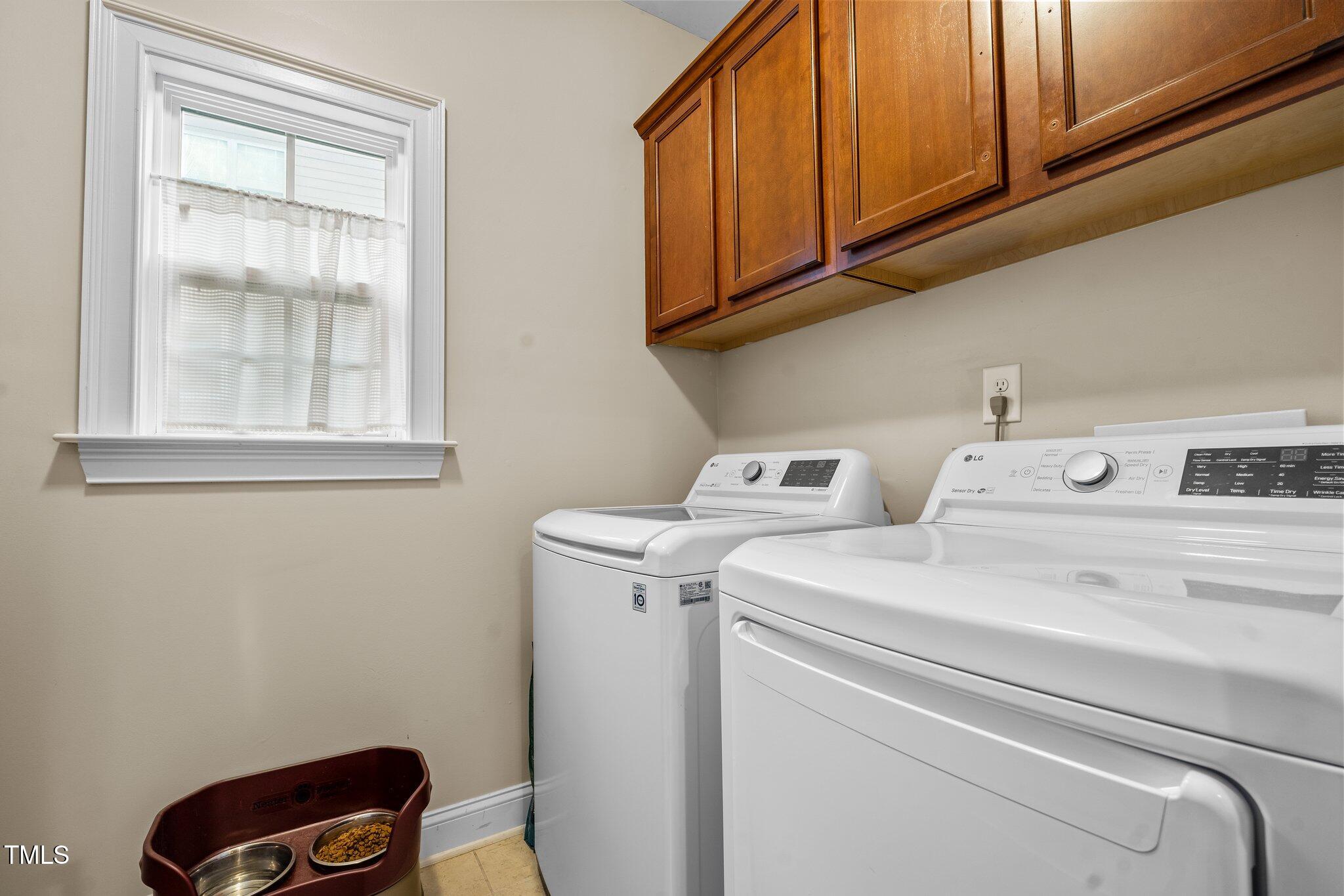 200 Heather Brook Circle Spring Lake, NC 28390 - Photo 17 of 36 a utility room with dryer and washer