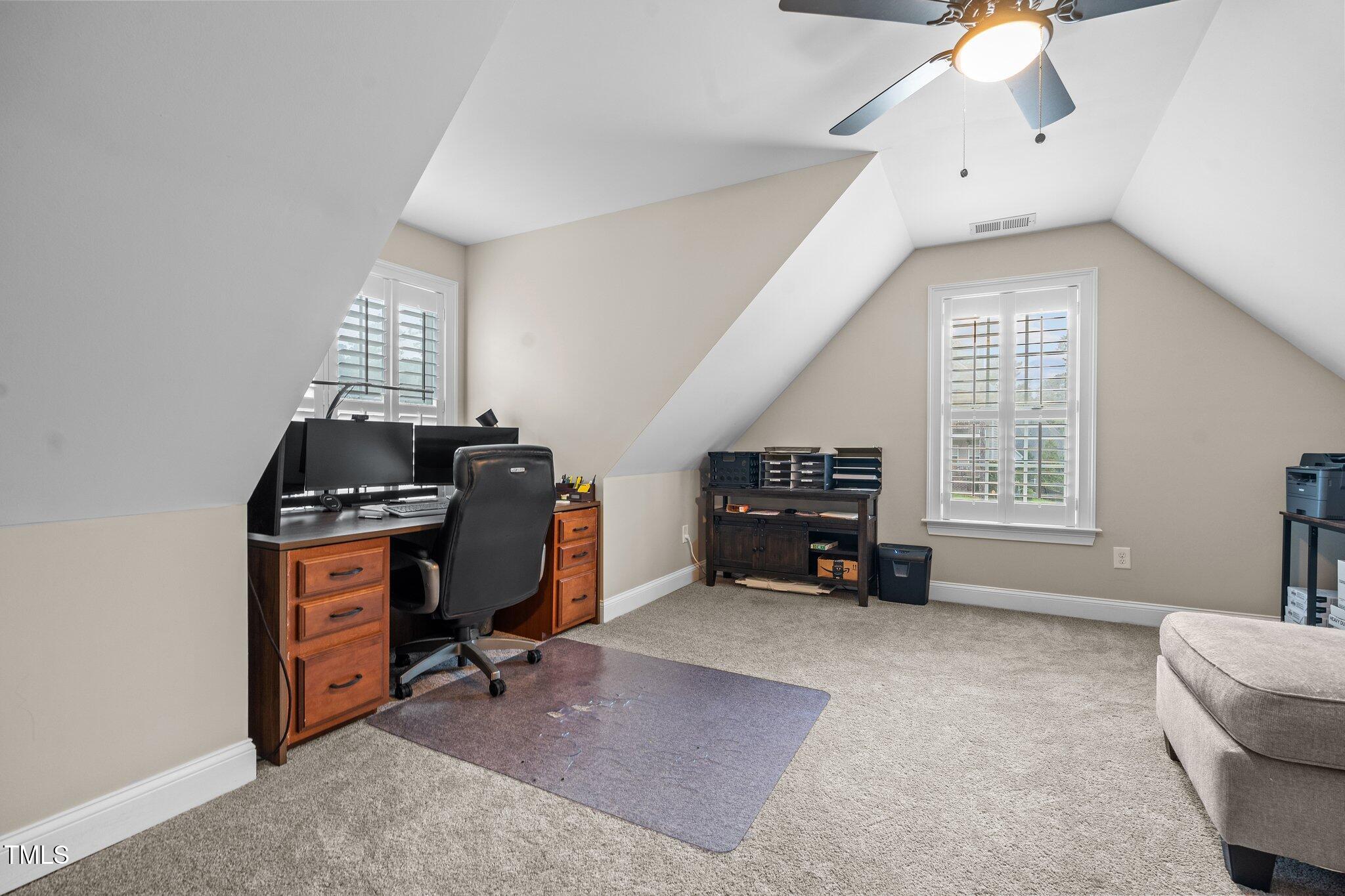 200 Heather Brook Circle Spring Lake, NC 28390 - Photo 22 of 36 a view of a workspace with furniture and a window
