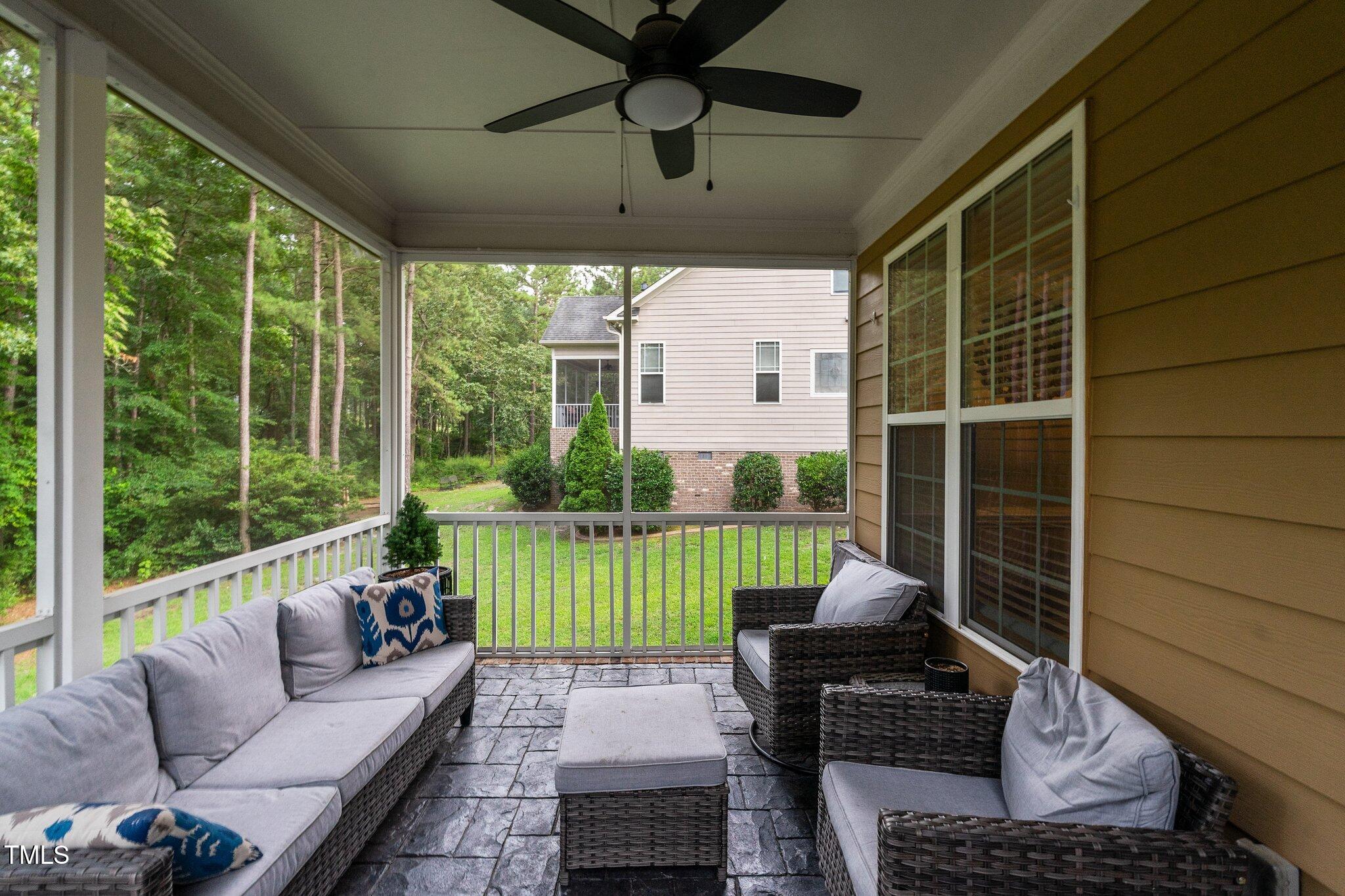 200 Heather Brook Circle Spring Lake, NC 28390 - Photo 27 of 36 a living room with furniture and a yard