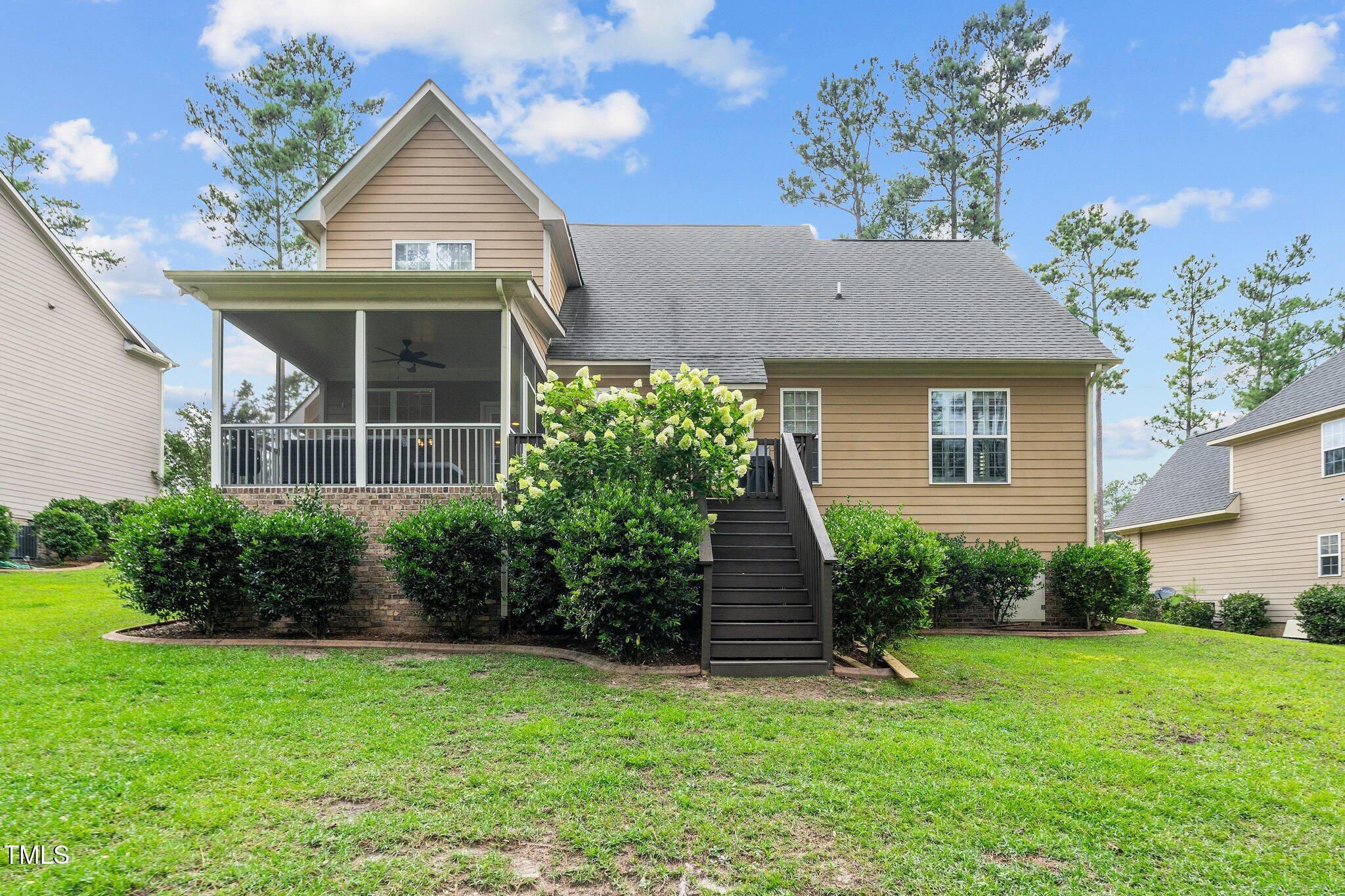 200 Heather Brook Circle Spring Lake, NC 28390 - Photo 32 of 36 a view of a house with garden