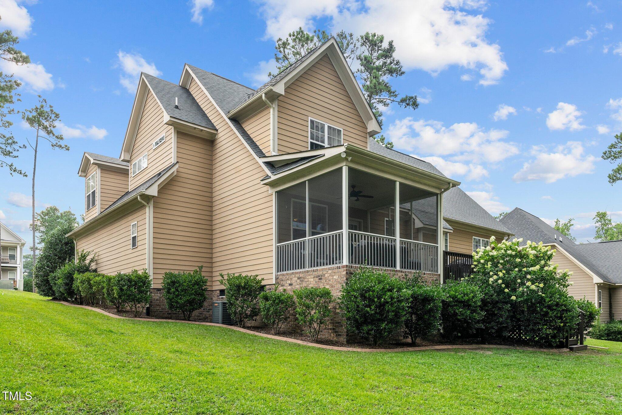 200 Heather Brook Circle Spring Lake, NC 28390 - Photo 33 of 36 a house view with a garden space