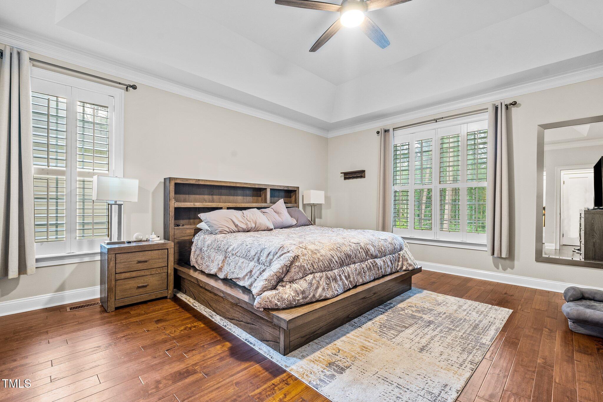 200 Heather Brook Circle Spring Lake, NC 28390 - Photo 9 of 36 a bedroom with a large bed and a window