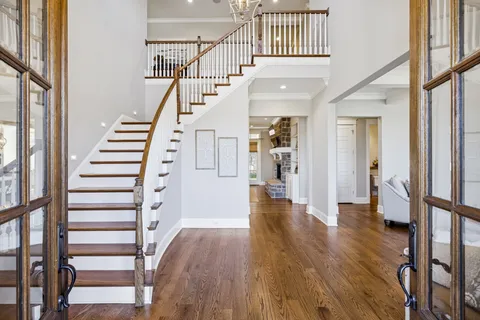 a kitchen with stainless steel appliances granite countertop a stove and a cabinets