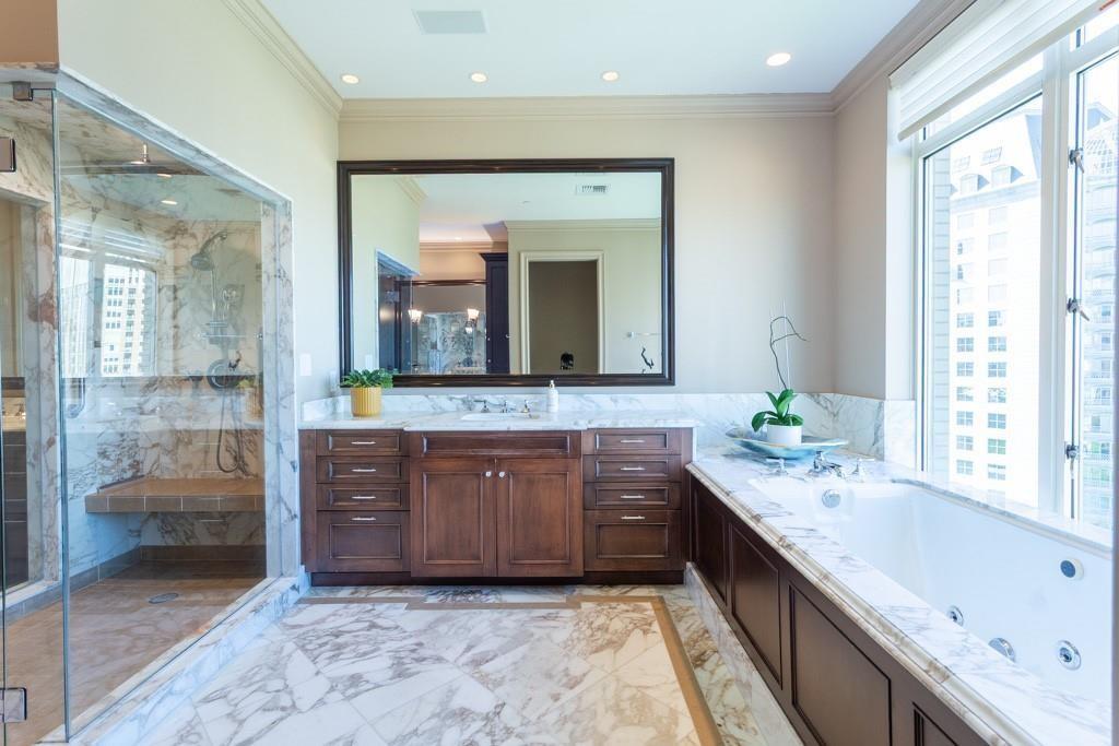 2525 North Pearl Street, Unit 1201 Dallas, TX 75201 - Photo 20 of 40 Calacatta Vagli marble floors and counters with Light Smoke Marble accents.