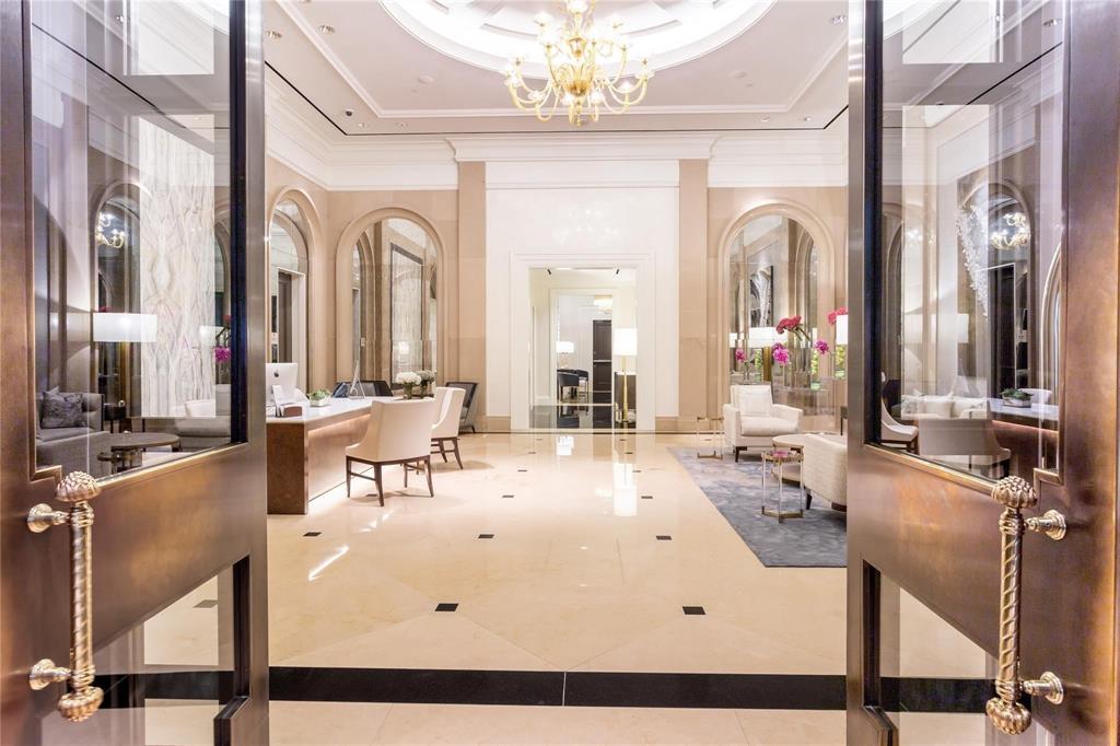 2525 North Pearl Street, Unit 1201 Dallas, TX 75201 - Photo 33 of 40 Exquisite Lobby with Concierge Desk & guest seating.
