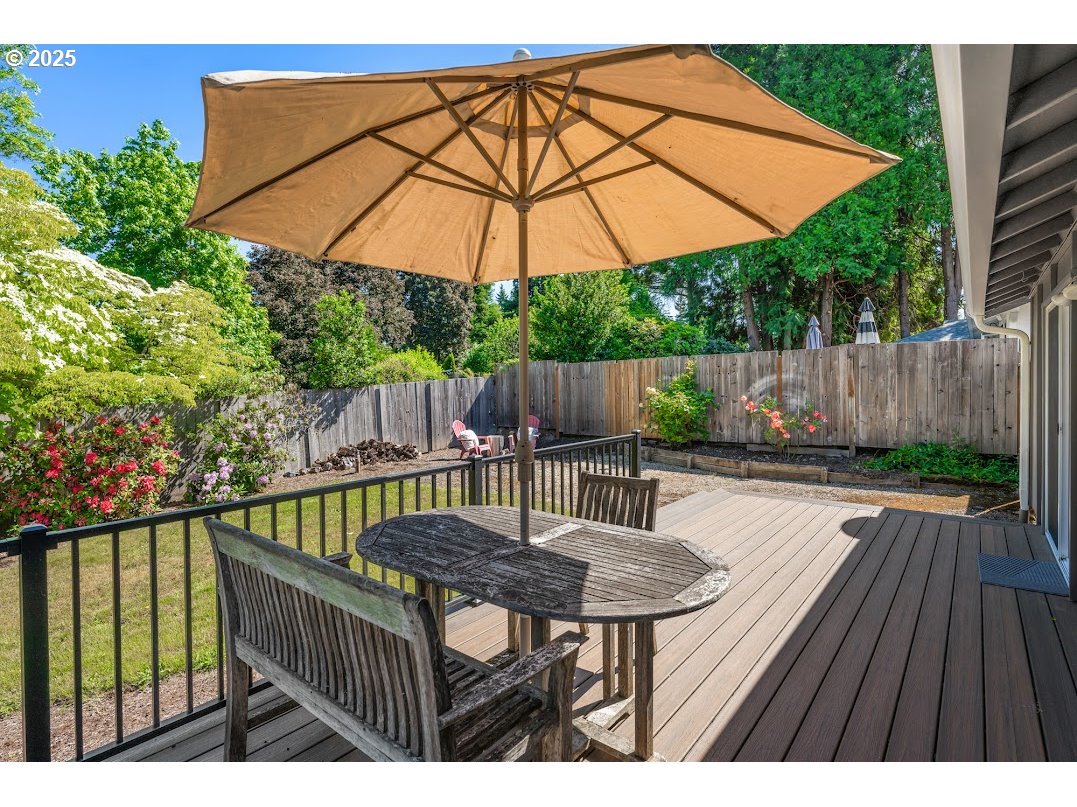 11595 Southwest Fairview Lane Tigard, OR 97223 - Photo 31 of 46 a view of backyard with outdoor seating and wooden floor