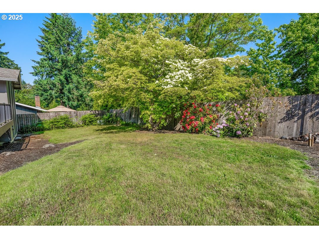 11595 Southwest Fairview Lane Tigard, OR 97223 - Photo 34 of 46 a view of an outdoor space and a yard