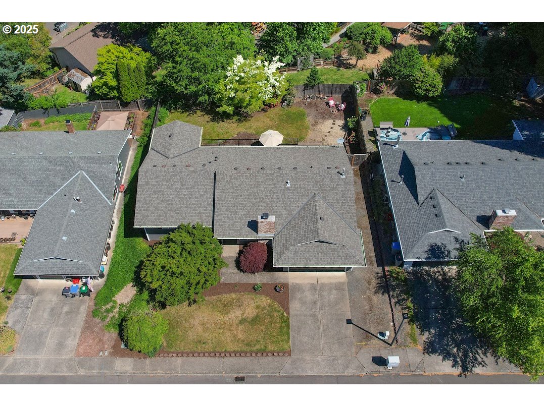 11595 Southwest Fairview Lane Tigard, OR 97223 - Photo 39 of 46 an aerial view of a house with a yard