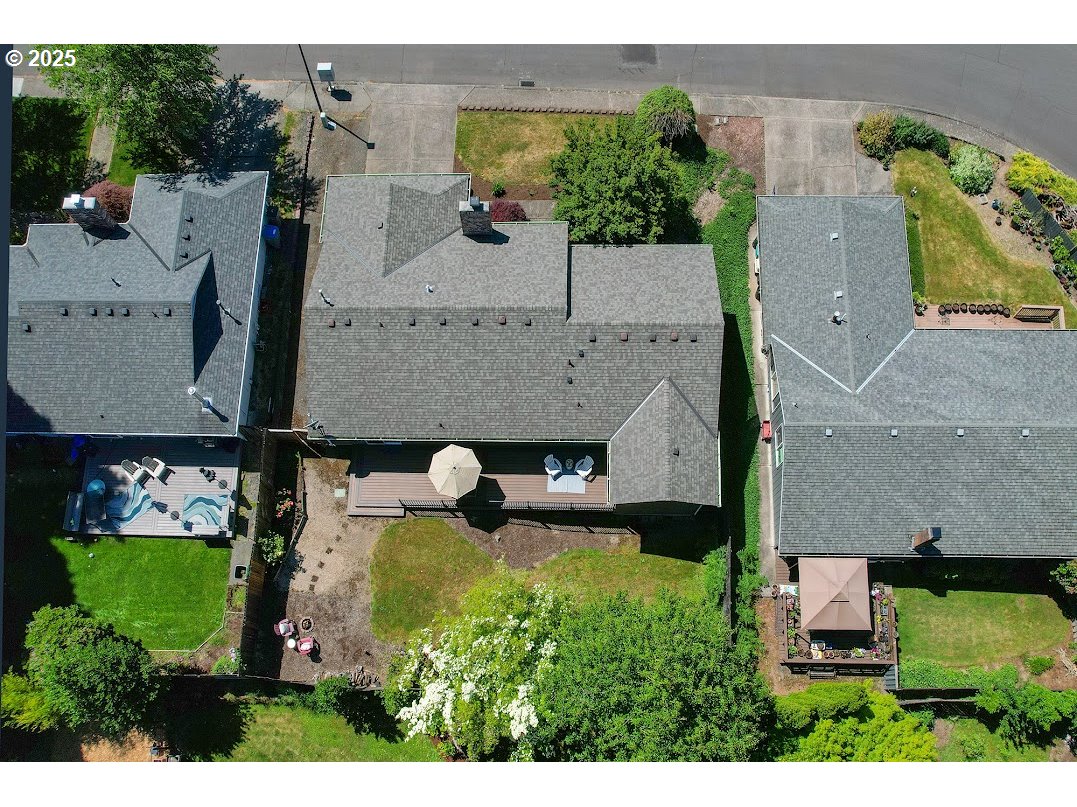 11595 Southwest Fairview Lane Tigard, OR 97223 - Photo 40 of 46 an aerial view of multiple houses with outdoor space
