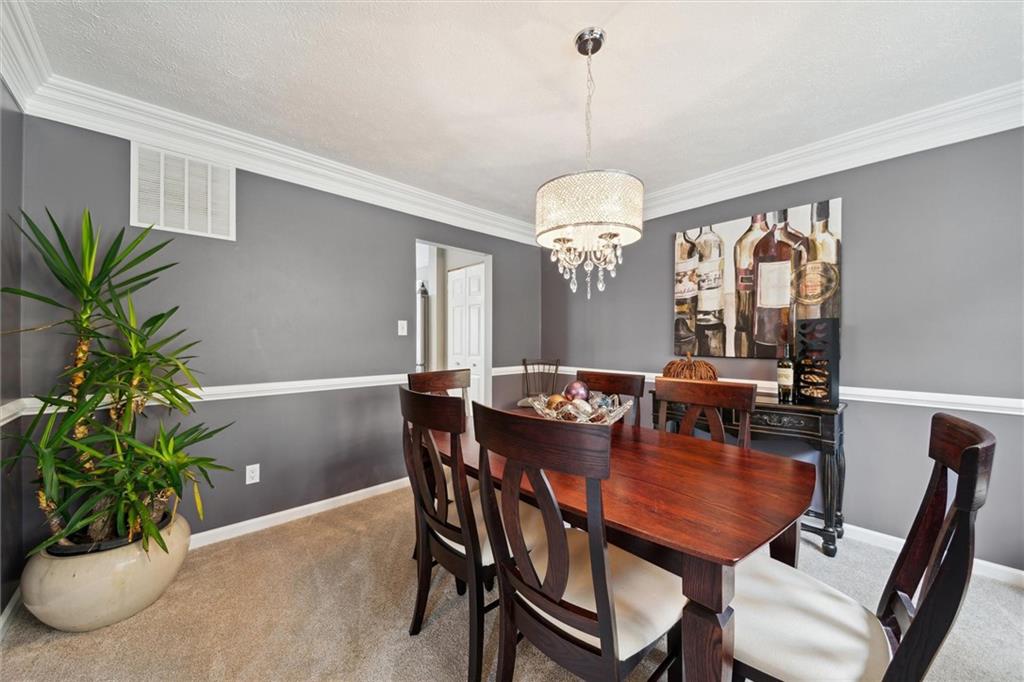 313 Timberlake Drive Venetia, PA 15367 - Photo 11 of 49 a view of a dining room with furniture window and wooden floor