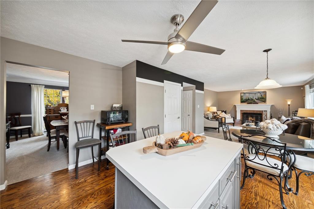 313 Timberlake Drive Venetia, PA 15367 - Photo 13 of 49 a view of a dining room with furniture and wooden floor