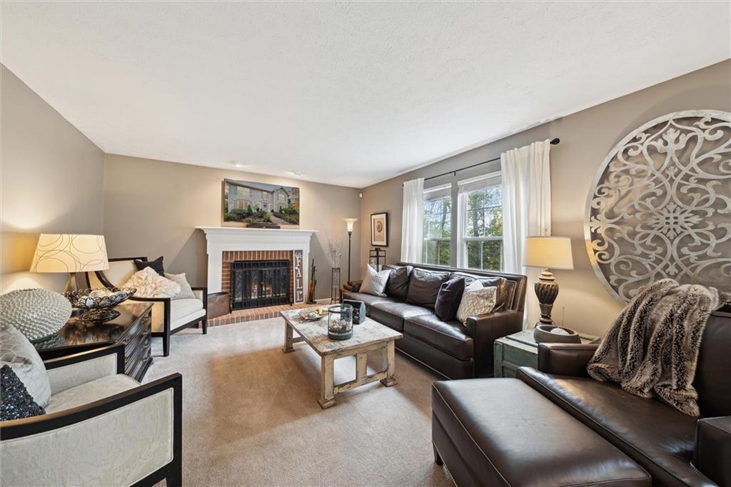 313 Timberlake Drive Venetia, PA 15367 - Photo 16 of 49 a living room with furniture and a fireplace