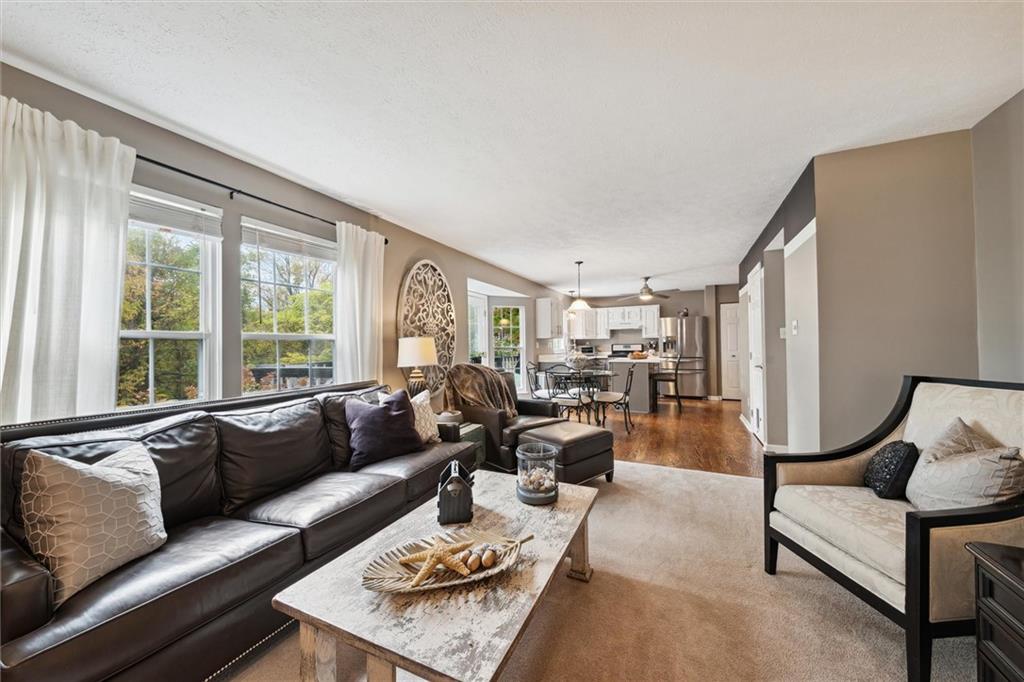 313 Timberlake Drive Venetia, PA 15367 - Photo 17 of 49 a living room with furniture and a large window