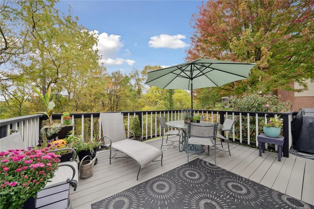 313 Timberlake Drive Venetia, PA 15367 - Photo 19 of 49 a view of a balcony with chairs and umbrella