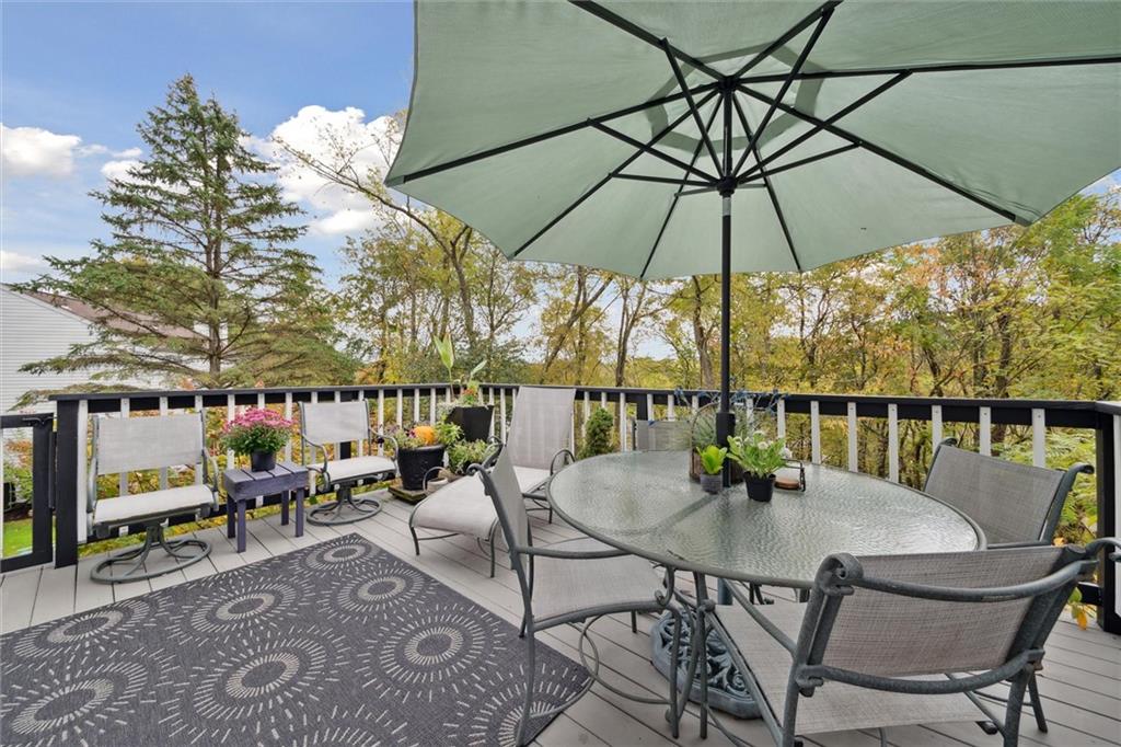 313 Timberlake Drive Venetia, PA 15367 - Photo 20 of 49 a view of balcony with furniture and umbrella