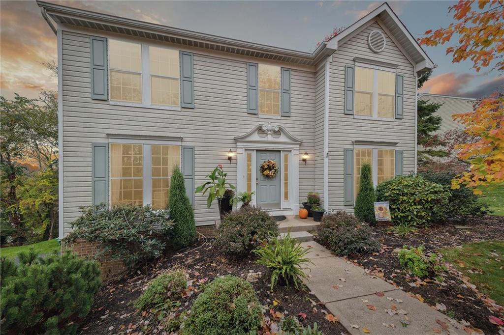 313 Timberlake Drive Venetia, PA 15367 - Photo 2 of 49 a front view of a house with garden