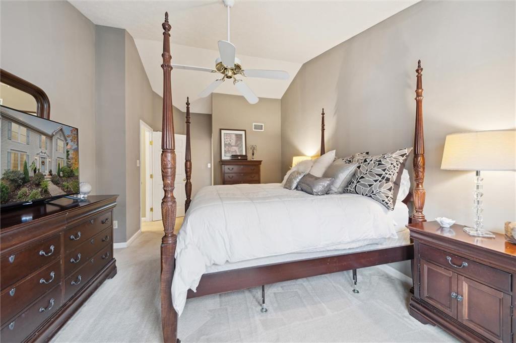 313 Timberlake Drive Venetia, PA 15367 - Photo 23 of 49 a bedroom with a bed and a flat screen tv