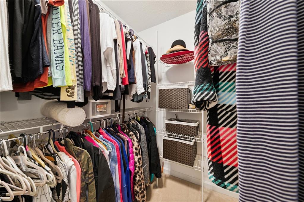 313 Timberlake Drive Venetia, PA 15367 - Photo 25 of 49 a view of walk in closet with clothes and shoes