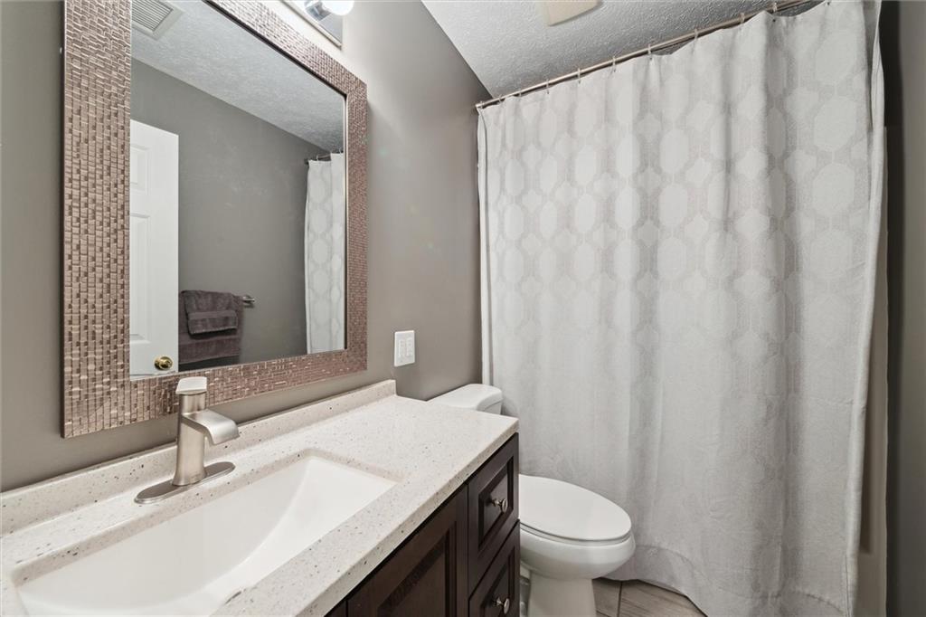313 Timberlake Drive Venetia, PA 15367 - Photo 28 of 49 a bathroom with a sink and a toilet